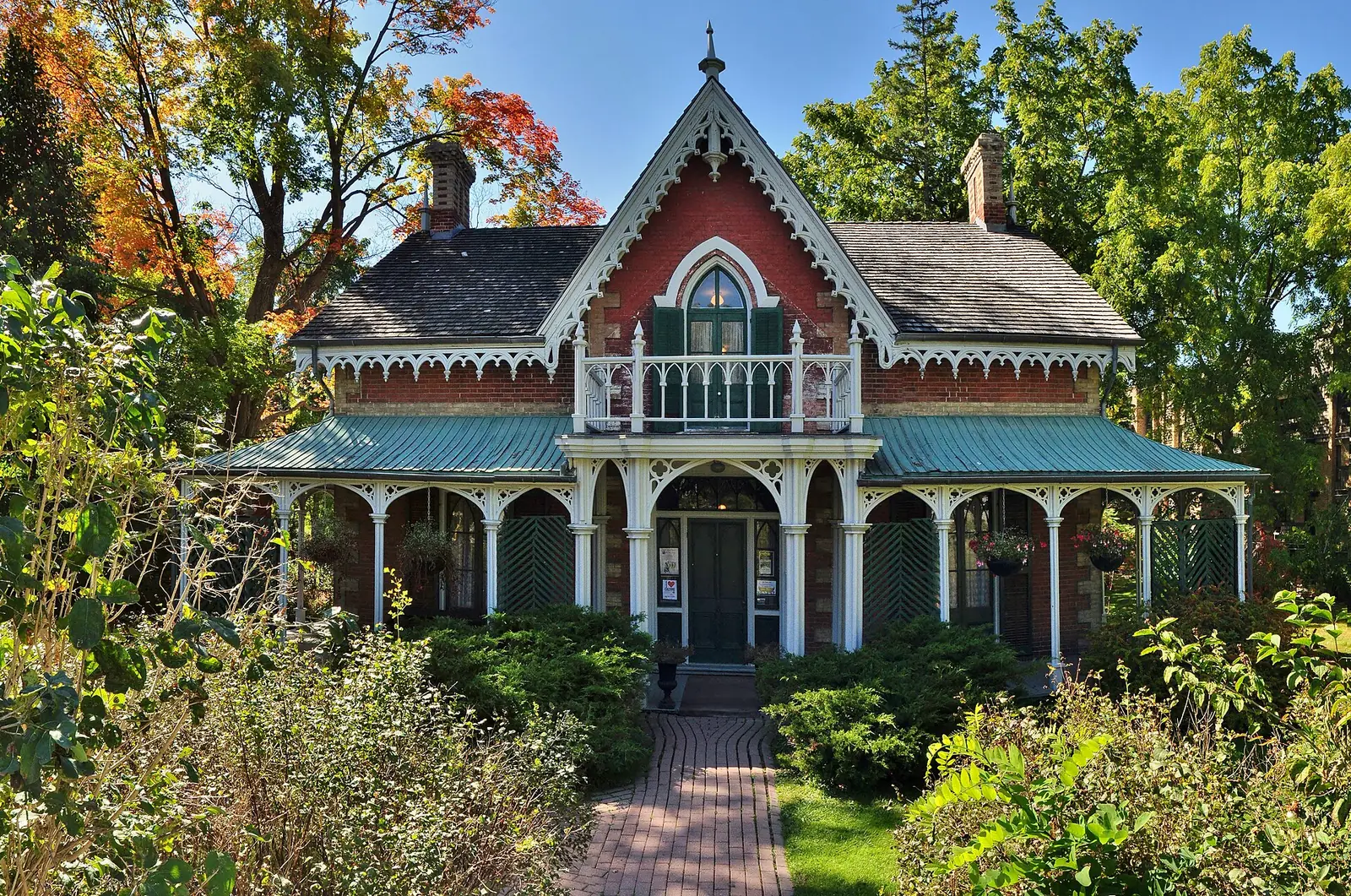 Hillary House, a Gothic Revival National Historic Site on Yonge Street in Aurora, framed by early autumn trees