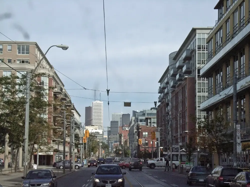 Mid-rise condo buildings lining King Street West near Bathurst Street, Toronto