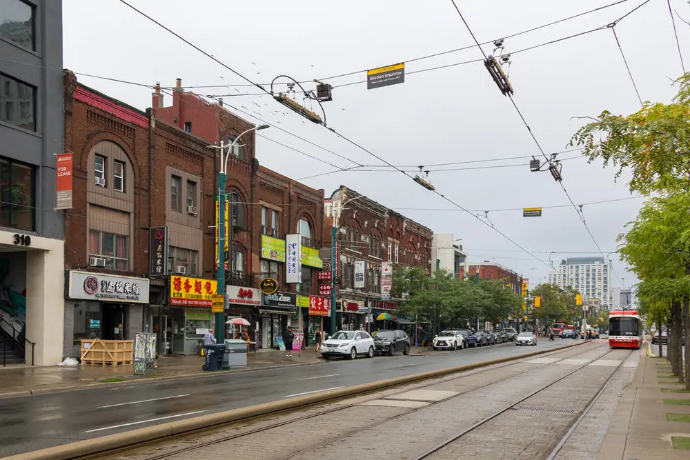 Brick buildings with shops and flats above along Spadina Avenue north of Dundas Street, Chinatown, Toronto