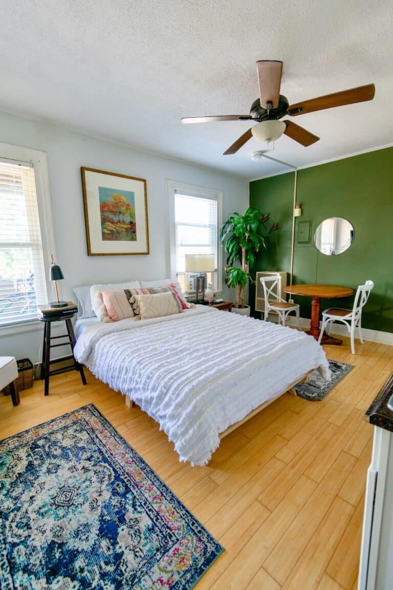 white bed linen on bed. Apartment interior design