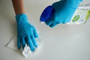 Blue cleaning gloves, spray, cloth, cleaning method