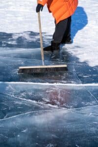 Cleaning ice outside winter