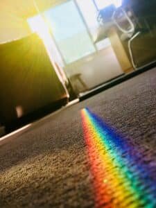 Carpet clean with a rainbow reflecting on it