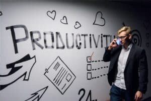 Productivity, Busy man in the cellphone, graphics on wall