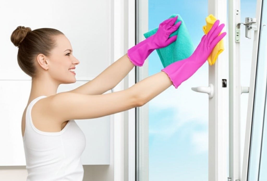 woman getting ready for July Cleaning