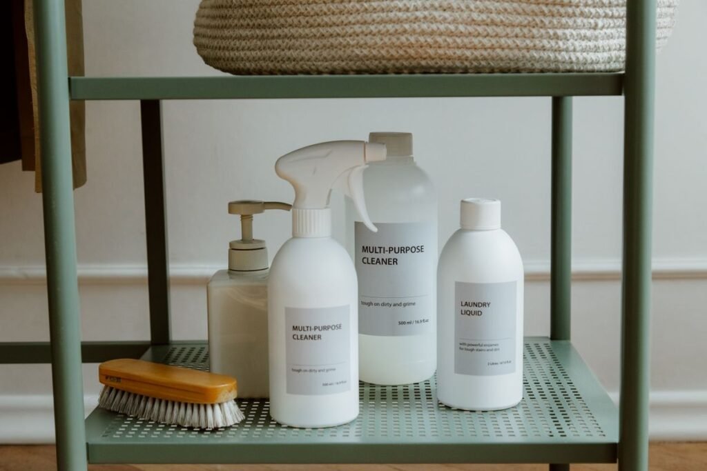 Minimal cleaning supplies on a shelf